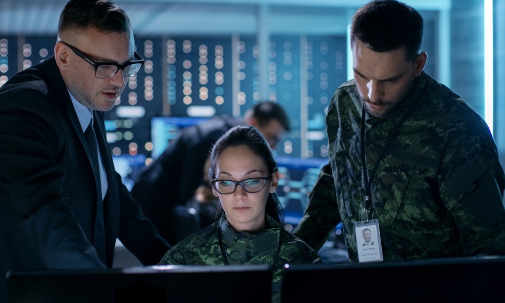 Government Surveillance Agency And Military Joint Operation. Male Agent, Female And Male Military Officers Working At System Control Center.