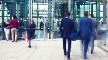 Business People Entering And Leaving Office Building, Motion Blur
