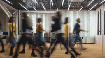 Group Of Business People Walking At Modern Open Space. Team Of Business Employees At Coworking Center. Motion Blur. Concept Work In Process