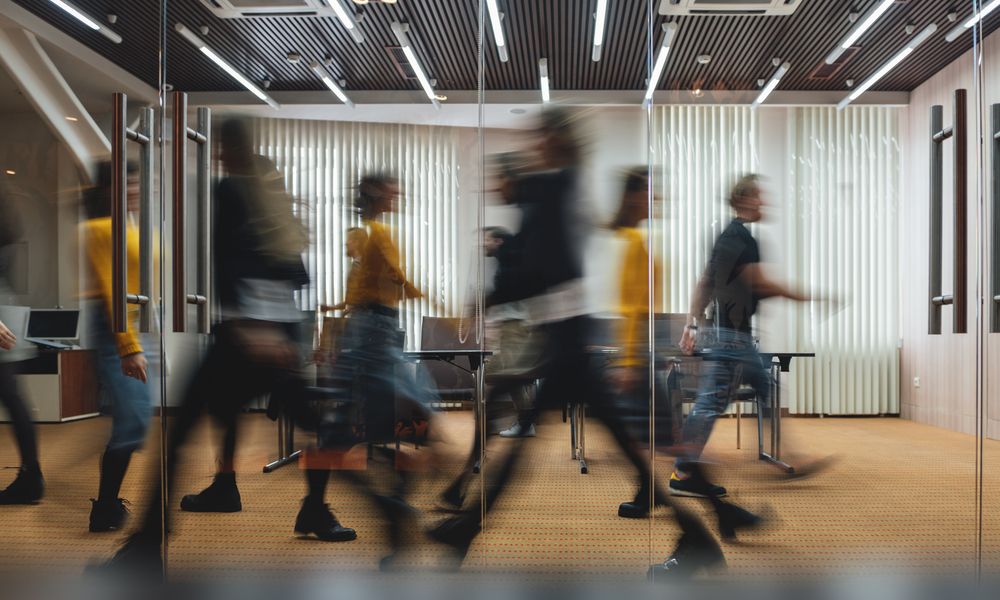 Group Of Business People Walking At Modern Open Space. Team Of Business Employees At Coworking Center. Motion Blur. Concept Work In Process