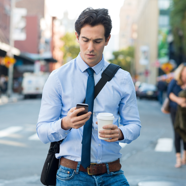 Man Texting On Phone