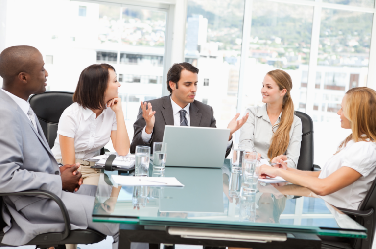 Office Workers At A Table